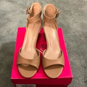 Brand new, never worn Nude/Tan chunky, low-heel dress shoe